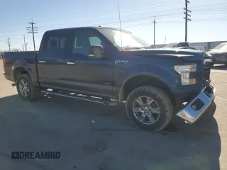 2015 Ford F-150 XLT with VIN 1FTEW1EG7FKE86979, listed as a Copart auction lot 48394035 with 118,642 mi miles and Salvage Title. Bid and sale history available at carsss.com. Image 4.