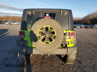 2013 Jeep Wrangler Rubicon 10th Anniversary with VIN 1C4BJWCG0DL506174, listed as a Copart auction lot 85300514 with 133,974 mi miles and Salvage Title. Bid and sale history available at DreamBid. Image 6.