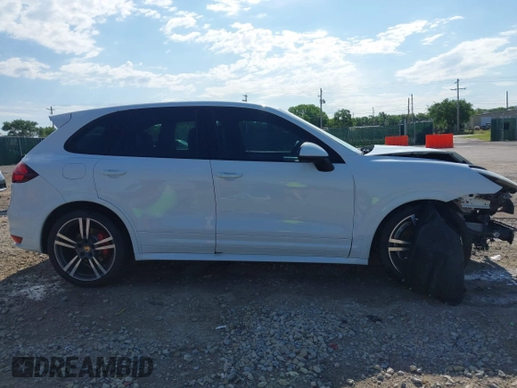 2013 Porsche Cayenne GTS with VIN WP1AD2A25DLA77759, listed as a IAAI auction lot 42316241 with 212,034 mi miles and . Bid and sale history available at DreamBid. Image 13.
