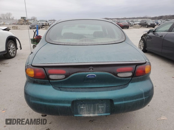 1997 Ford Taurus G with VIN 1FALP51U2VG299048, listed as a Copart auction lot 85742504 with 123,356 mi miles and Salvage Title. Bid and sale history available at carsss.com. Image 6.