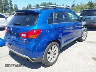2015 Mitsubishi Outlander GT with VIN 4A4AR4AWXFE047335, listed as a IAAI auction lot 42720990 with 164,672 mi miles and . Bid and sale history available at DreamBid. Image 4.