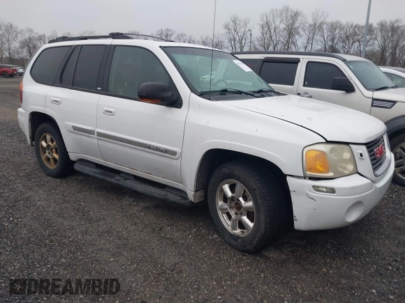 2003 GMC Envoy SLE with VIN 1GKDT13S732332171, listed as a IAAI auction lot 41520620 with 222,373 mi miles. Bid and sale history available at carsss.com. Image 1.