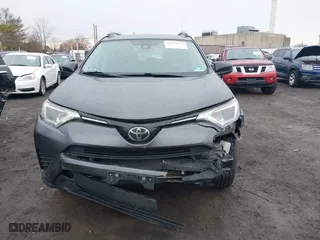 2018 Toyota RAV4 LE with VIN JTMBFREV0JJ223957, listed as a IAAI auction lot 41652810 with 144,629 mi miles. Bid and sale history available at carsss.com. Image 12.