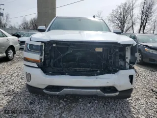 2018 Chevrolet Silverado 1500 LT with VIN 3GCUKREC7JG514282, listed as a Copart auction lot 51233285 with 201,593 mi miles and Clean Title. Bid and sale history available at carsss.com. Image 5.