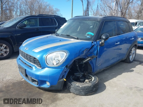 2014 MINI Countryman S with VIN WMWZC5C54EWM17299, listed as a IAAI auction lot 41655370 with 104,264 mi miles and . Bid and sale history available at DreamBid. Image 2.