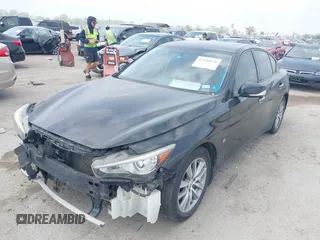 2015 Infiniti Q50 Premium z VIN JN1BV7AP3FM347065, wystawiony jako IAAI lot #41926070 z przebiegiem 110 487 mil mil oraz . Historia ofert i sprzedaży dostępna na DreamBid. Obrazek 18.