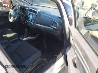 2016 Honda Fit LX with VIN JHMGK5H5XGS012952, listed as a IAAI auction lot 41625842 with 126,451 mi miles. Bid and sale history available at carsss.com. Image 5.