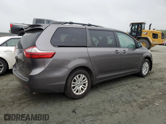 2015 Toyota Sienna XLE with VIN 5TDYK3DC6FS660035, listed as a Copart auction lot 51660075 with 176,968 mi miles and Salvage Title. Bid and sale history available at DreamBid. Image 3.