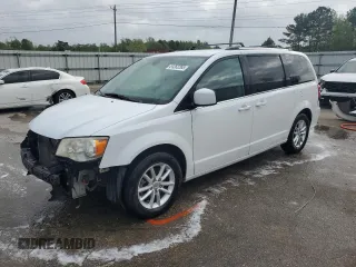 2018 Dodge Grand Caravan SXT z VIN 2C4RDGCG8JR361187, wystawiony jako Copart lot #51262265 z przebiegiem 142 575 mil mil oraz Szkody całkowita. Historia ofert i sprzedaży dostępna na DreamBid. Obrazek 1.
