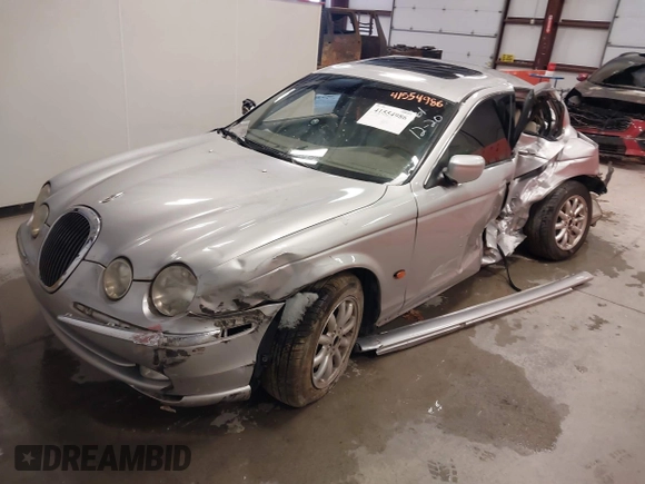 2001 Jaguar S-Type with VIN SAJDA01P81GM09061, listed as a IAAI auction lot 41554986 with 104,105 mi miles and . Bid and sale history available at DreamBid. Image 2.