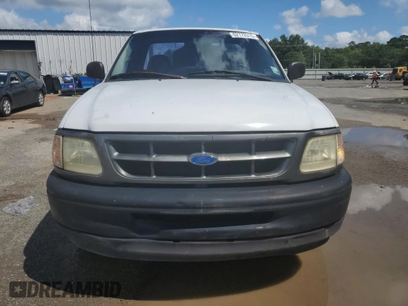 1997 Ford F-150 with VIN 1FTDF1721VND40734, listed as a Copart auction lot 62172315 with 158,102 mi miles and Salvage title. Bid and sale history available at DreamBid. Image 5.