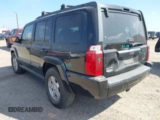 2008 Jeep Commander Sport with VIN 1J8HG48K38C111866, listed as a IAAI auction lot 41469973 with 201,781 mi miles. Bid and sale history available at carsss.com. Image 3.