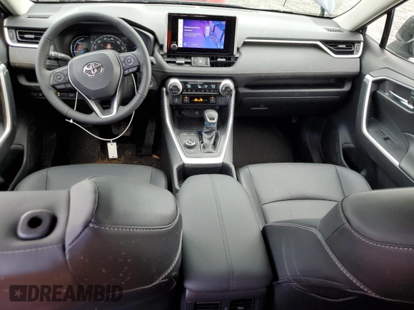 2024 Toyota RAV4 Hybrid XLE Premium with VIN JTMB6RFV4RD151024, listed as a Copart auction lot 46646405 with 3,310 mi miles and Salvage Title. Bid and sale history available at DreamBid. Image 8.