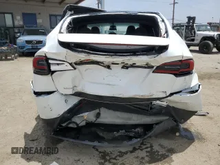 2017 Tesla Model X 90D with VIN 5YJXCAE26HF079421, listed as a Copart auction lot 47889005 with 88,281 mi miles and Salvage Title. Bid and sale history available at DreamBid. Image 6.