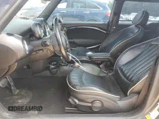 2012 MINI Hardtop S with VIN WMWSV3C50CTY18637, listed as a Copart auction lot 57771015 with 103,402 mi miles and Salvage title. Bid and sale history available at DreamBid. Image 7.