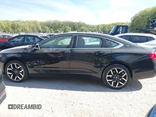 2018 Chevrolet Impala LT z VIN 2G1105S38J9106687, wystawiony jako IAAI lot #42236177 z przebiegiem 104 509 mil mil oraz . Historia ofert i sprzedaży dostępna na DreamBid. Obrazek 14.
