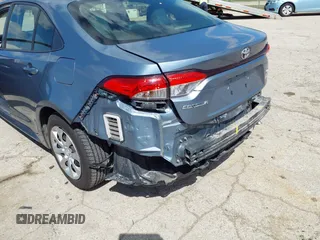 2020 Toyota Corolla LE with VIN JTDEPRAE0LJ070323, listed as a IAAI auction lot 41985664 with 57,502 mi miles and . Bid and sale history available at DreamBid. Image 6.