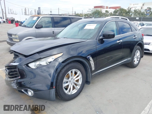 2014 Infiniti QX70 z VIN JN8CS1MW6EM410091, wystawiony jako IAAI lot #41896327 z przebiegiem 139 021 mil mil oraz . Historia ofert i sprzedaży dostępna na DreamBid. Obrazek 17.