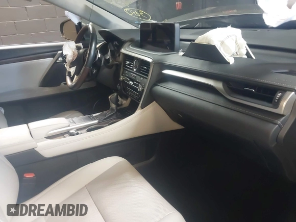 2020 Lexus RX 350 with VIN 2T2HZMDA0LC241565, listed as a IAAI auction lot 42556825 with 48,840 mi miles and . Bid and sale history available at DreamBid. Image 5.