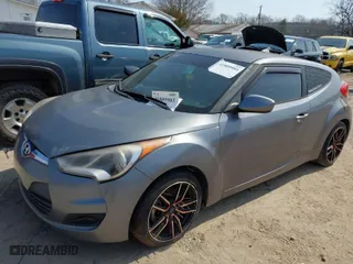 2016 Hyundai Veloster with VIN KMHTC6AD7GU277669, listed as a IAAI auction lot 41809903 with 127,325 mi miles. Bid and sale history available at carsss.com. Image 2.
