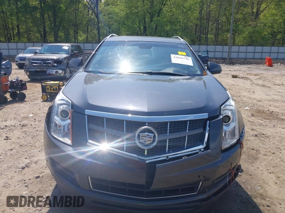 2012 Cadillac SRX Luxury Collection with VIN 3GYFNAE36CS657803, listed as a IAAI auction lot 42016746 with 209,754 mi miles and . Bid and sale history available at carsss.com. Image 12.
