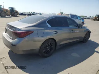 2014 Infiniti Q50 Premium with VIN JN1BV7AP2EM677469, listed as a Copart auction lot 61627125 with 106,670 mi miles and Salvage title. Bid and sale history available at DreamBid. Image 3.