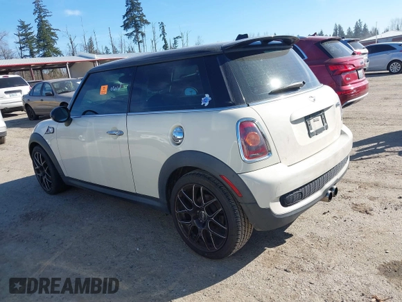 2009 MINI Hardtop S with VIN WMWMF73519TT99560, listed as a IAAI auction lot 41691939 with Not provided miles and . Bid and sale history available at DreamBid. Image 3.