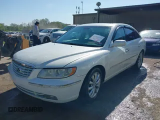 2006 Hyundai Azera SE with VIN KMHFC46F66A097045, listed as a IAAI auction lot 41998208 with 203,817 mi miles and . Bid and sale history available at DreamBid. Image 2.