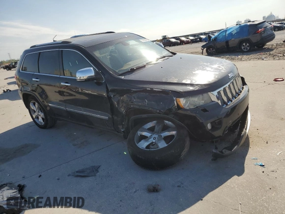 2013 Jeep Grand Cherokee Overland with VIN 1C4RJECT8DC556536, listed as a Copart auction lot 52758795 with 67,123 mi miles and Salvage Title. Bid and sale history available at carsss.com. Image 4.