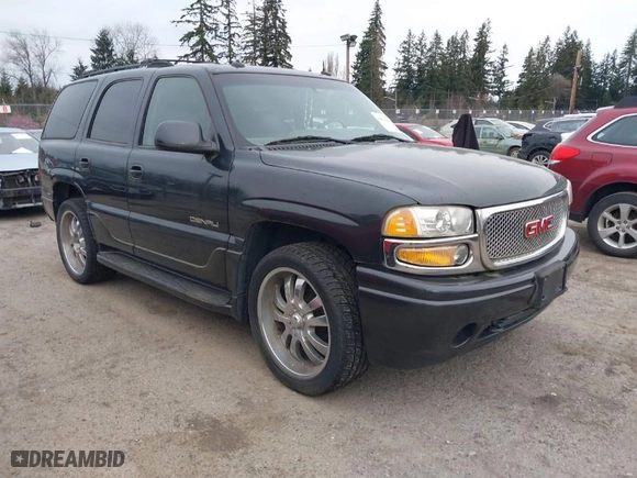 2003 GMC Yukon Denali with VIN 1GKEK63U73J310098, listed as a IAAI auction lot 41831615 with 262,134 mi miles. Bid and sale history available at carsss.com. Image 1.