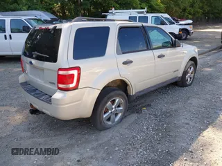 2008 Ford Escape XLT with VIN 1FMCU93198KE17879, listed as a IAAI auction lot 40125825 with 214,373 mi miles and . Bid and sale history available at DreamBid. Image 4.