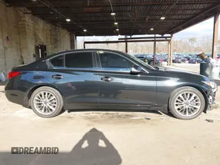 2023 Infiniti Q50 Luxe with VIN JN1EV7BR0PM542376, listed as a IAAI auction lot 41215300 with 25,792 mi miles and . Bid and sale history available at DreamBid. Image 14.