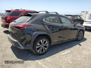 2019 Lexus UX 250h with VIN JTHU9JBH2K2013001, listed as a Copart auction lot 59142205 with 104,917 mi miles and Salvage title. Bid and sale history available at DreamBid. Image 3.