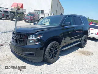 2016 Chevrolet Tahoe LT z VIN 1GNSCBKC0GR361339, wystawiony jako IAAI lot #42026931 z przebiegiem 123 927 mil mil oraz . Historia ofert i sprzedaży dostępna na DreamBid. Obrazek 17.