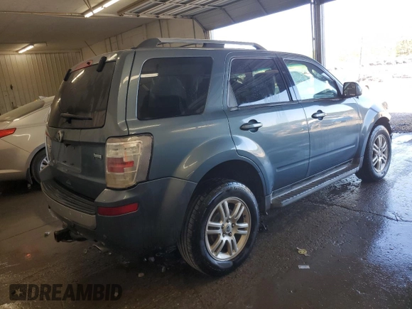 2010 Mercury Mariner Premier z VIN 4M2CN8HG3AKJ29557, wystawiony jako Copart lot #53318115 z przebiegiem 141 895 mil mil oraz Szkoda całkowita • Salvage title. Historia ofert i sprzedaży dostępna na DreamBid. Obrazek 3.