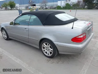 2003 Mercedes-Benz CLK-Class 3.2L with VIN WDBLK65G13T138714, listed as a IAAI auction lot 41667330 with 235,314 mi miles. Bid and sale history available at carsss.com. Image 3.