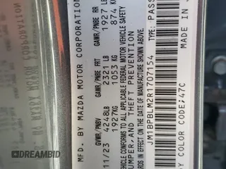 2024 Mazda 3 S Carbon Edition z VIN JM1BPBLM2R1707154, wystawiony jako Copart lot #63242765 z przebiegiem Nie podano mil oraz Nie do naprawy • Non repairable. Historia ofert i sprzedaży dostępna na DreamBid. Obrazek 13.