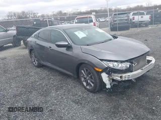 2019 Honda Civic LX with VIN 2HGFC2F60KH591472, listed as a IAAI auction lot 41738084 with 38,927 mi miles and . Bid and sale history available at DreamBid. Image 1.