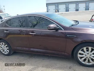 2014 Kia Optima EX z VIN 5XXGN4A77EG338455, wystawiony jako IAAI lot #42071765 z przebiegiem 136 331 mil mil oraz . Historia ofert i sprzedaży dostępna na DreamBid. Obrazek 13.