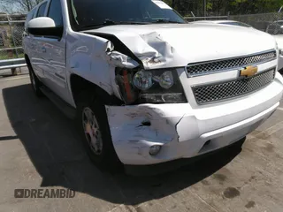 2014 Chevrolet Suburban LT with VIN 1GNSCJE05ER117663, listed as a IAAI auction lot 41992835 with 208,754 mi miles. Bid and sale history available at carsss.com. Image 6.