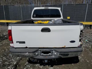 2000 Ford Super Duty F-250 XL with VIN 1FTNX21F4YED40038, listed as a Copart auction lot 49989245 with 248,586 mi miles and Salvage Title. Bid and sale history available at carsss.com. Image 6.