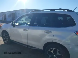 2014 Subaru Forester XT Touring with VIN JF2SJGPC9EH417920, listed as a IAAI auction lot 41270689 with 184,976 mi miles and . Bid and sale history available at DreamBid. Image 14.