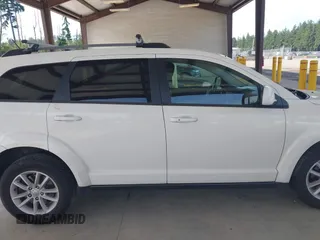 2017 Dodge Journey SXT z VIN 3C4PDDBG2HT677960, wystawiony jako IAAI lot #42443098 z przebiegiem 114 118 mil mil oraz . Historia ofert i sprzedaży dostępna na DreamBid. Obrazek 13.