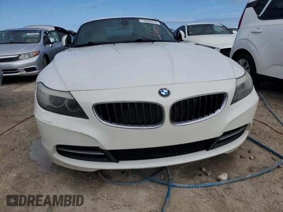 2011 BMW Z4 sDrive30i with VIN WBALM5C54BE379870, listed as a Copart auction lot 74458414 with Not provided miles and Non repairable. Bid and sale history available at DreamBid. Image 5.