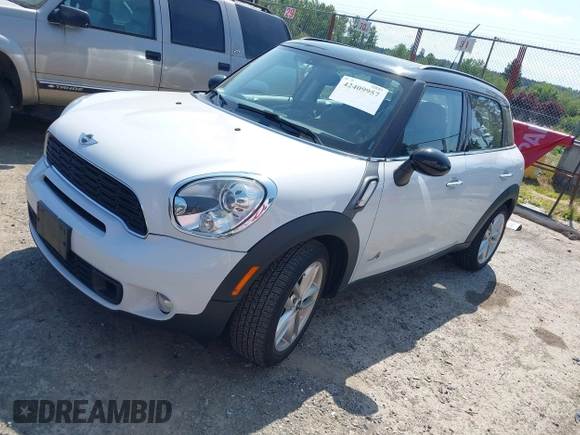 2014 MINI Countryman S z VIN WMWZC5C52EWP39083, wystawiony jako IAAI lot #42409957 z przebiegiem 73 497 mil mil oraz . Historia ofert i sprzedaży dostępna na DreamBid. Obrazek 2.