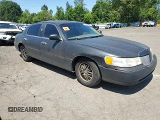 2001 Lincoln Town Car Cartier L z VIN 1LNHM85W71Y624315, wystawiony jako Copart lot #60479385 z przebiegiem 171 485 mil mil oraz Czysty tytuł • Clean title. Historia ofert i sprzedaży dostępna na DreamBid. Obrazek 4.