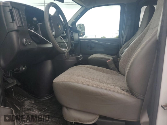 2014 Chevrolet Express Passenger 1LT with VIN 1GAZGYFG9E1207695, listed as a Copart auction lot 62146754 with 108,836 mi miles and Salvage title. Bid and sale history available at DreamBid. Image 7.
