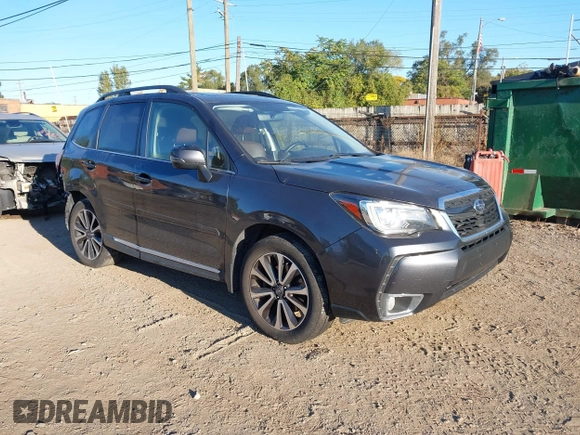 2017 Subaru Forester Touring with VIN JF2SJGTC3HH516646, listed as a IAAI auction lot 40560446 with 85,842 mi miles. Bid and sale history available at carsss.com. Image 1.