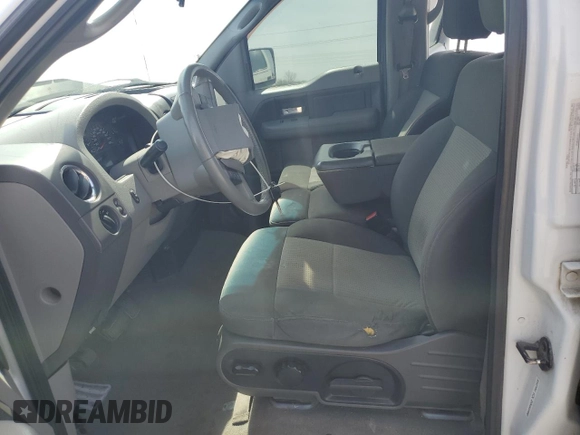 2007 Ford F-150 XLT with VIN 1FTPW14V17FB63238, listed as a Copart auction lot 52398225 with 171,121 mi miles and Salvage title. Bid and sale history available at DreamBid. Image 7.