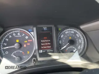 2023 Toyota Tacoma SR5 z VIN 3TMDZ5BN7PM140616, wystawiony jako Copart lot #51951945 z przebiegiem 30 274 mil mil oraz Szkoda całkowita • Salvage title. Historia ofert i sprzedaży dostępna na DreamBid. Obrazek 9.